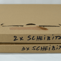 Verpakking van de LP's en foto's van een uitgave uit 2007 van een fotoserie van Thomas Scheibitz